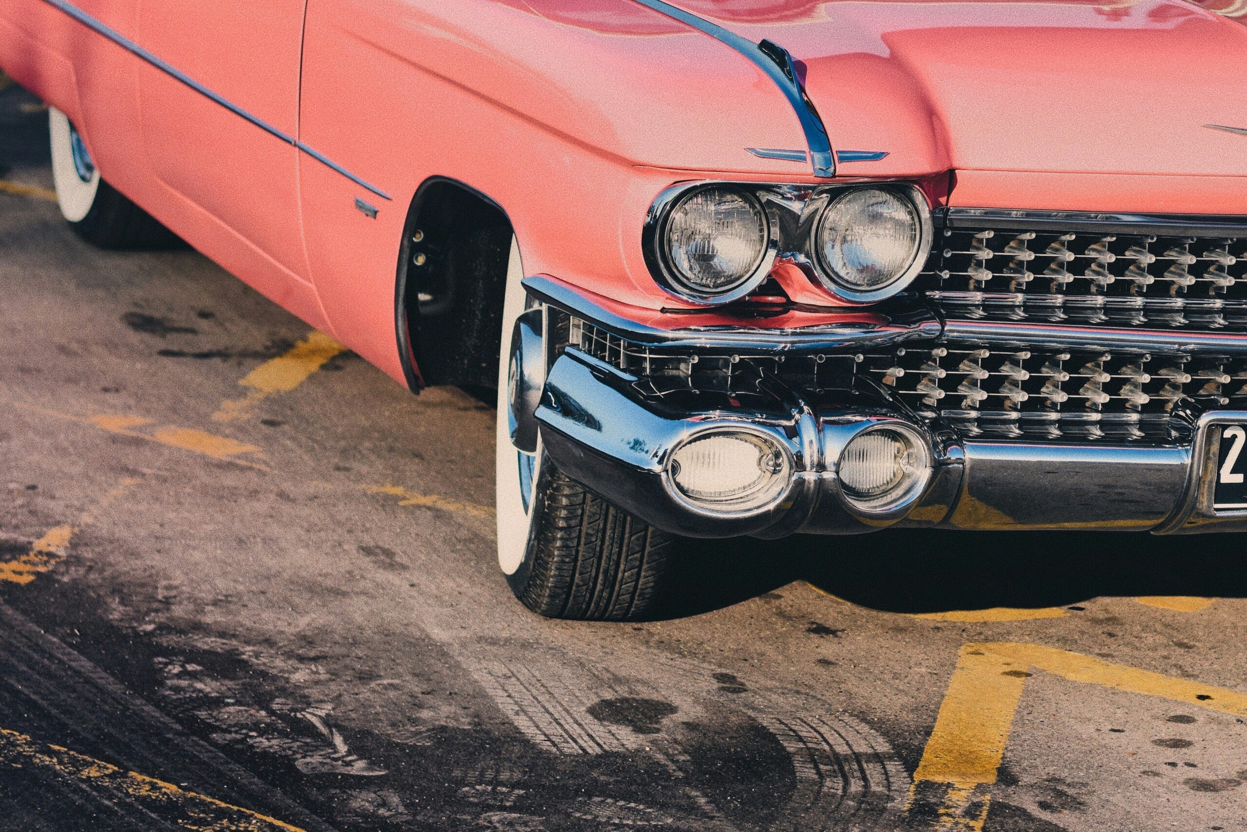 Front end of a pink vintage car